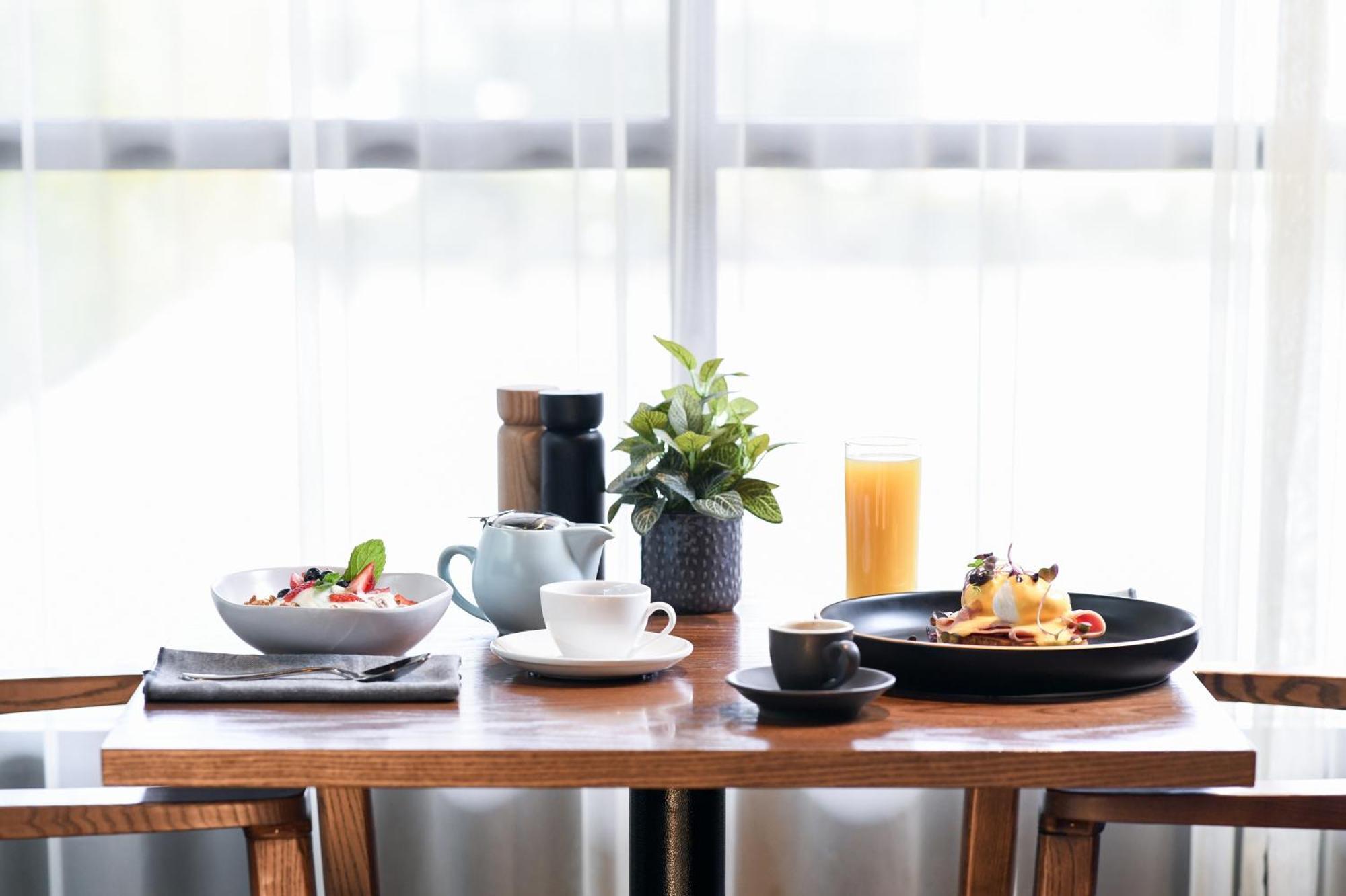 พาวเวอร์เฮาส์ โฮเต็ล แทมเวิร์ท บาย ริดจ์ Hotel แทมเวิร์ธ ภายนอก รูปภาพ A breakfast table